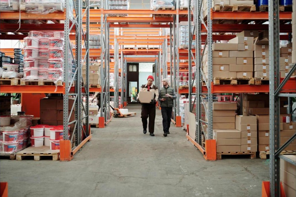 Newhouse Logistics warehouse team moving inventory